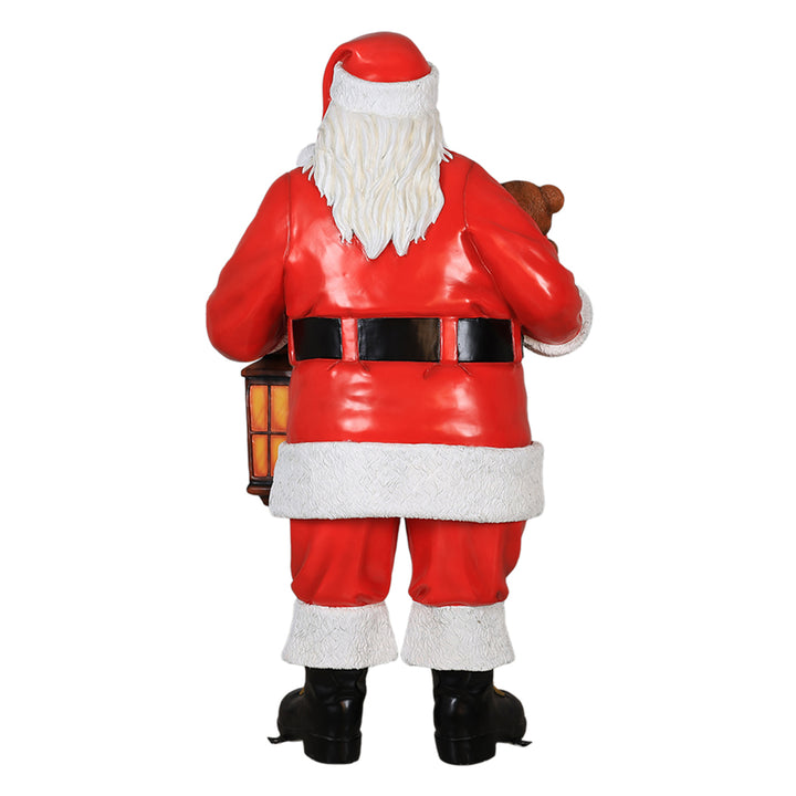 Santa Claus Holding Bear and Lantern