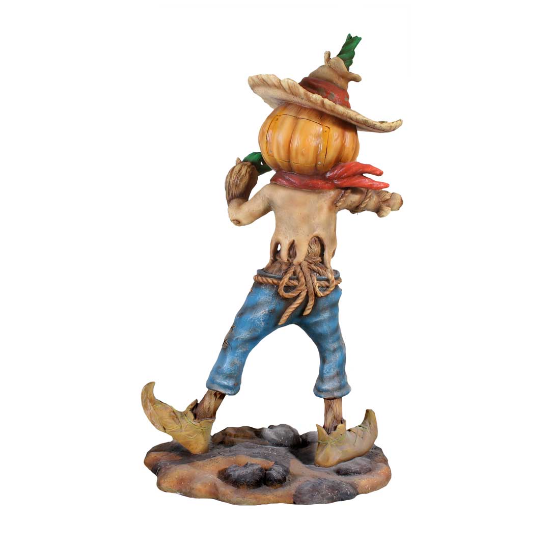 Pumpkin Scarecrow Playing Harmonica