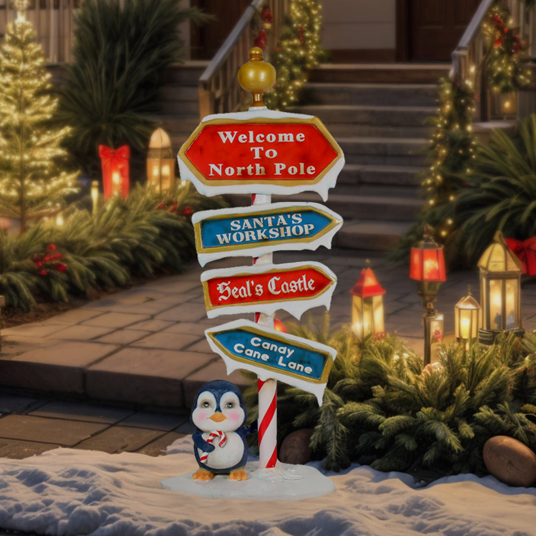 North Pole Sign With Baby Penguin