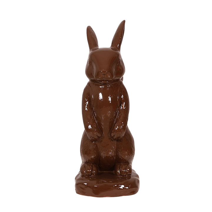 chocolate-colored bunny with easter basket front view