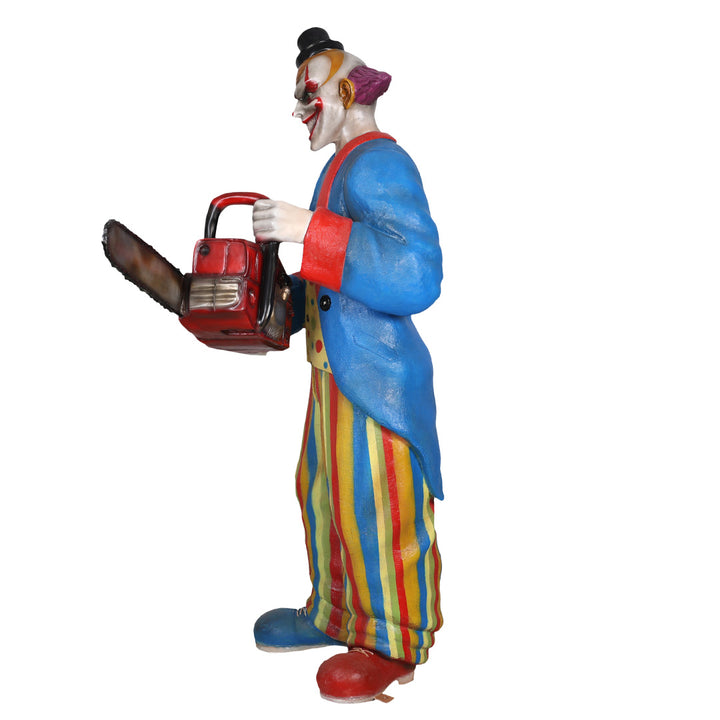 A scary clown with chainsaw side view