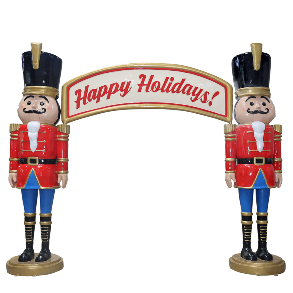 traditional nutcracker with "Happy Holidays!" banner on top